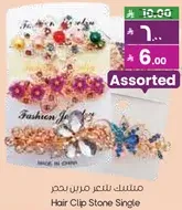 Assorted hair clips with stones.