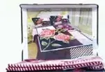 A beautiful bedding set with floral designs, perfect for enhancing the look of your bedroom.