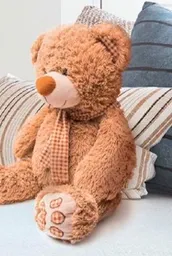 A soft and cuddly teddy bear, perfect for children.