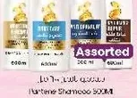 Assorted hair care products including various types of shampoos.