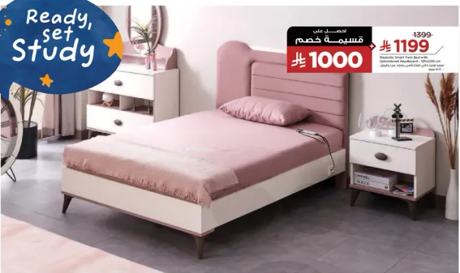 A stylish bed with a comfortable mattress and matching nightstands.