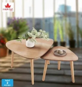 A set of two triangular tables, perfect for home decor.