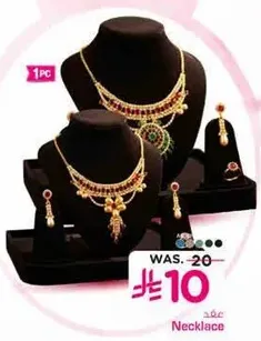 Necklace set with intricate designs.