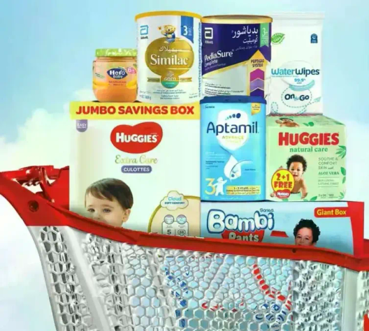 A collection of baby care products including diapers, wipes, and milk formula.