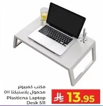 Portable plastic laptop desk.