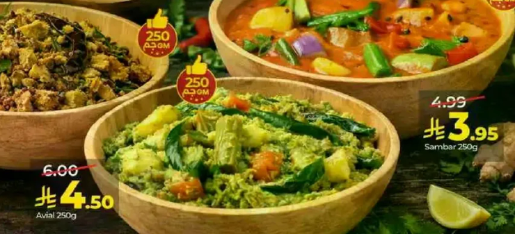 A variety of ready-to-eat dishes including sambar and mixed vegetables.