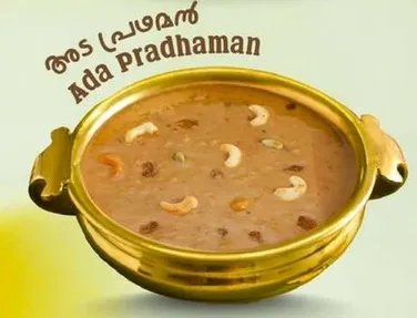 ادا برادهامان هو حلوي تقليديه من كيرالا مصنوعه من رقايق الارز، السكر البني، وحليب جوز الهند، مزينه بالمكسرات.